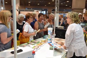 Visitor standing at exhibition stand