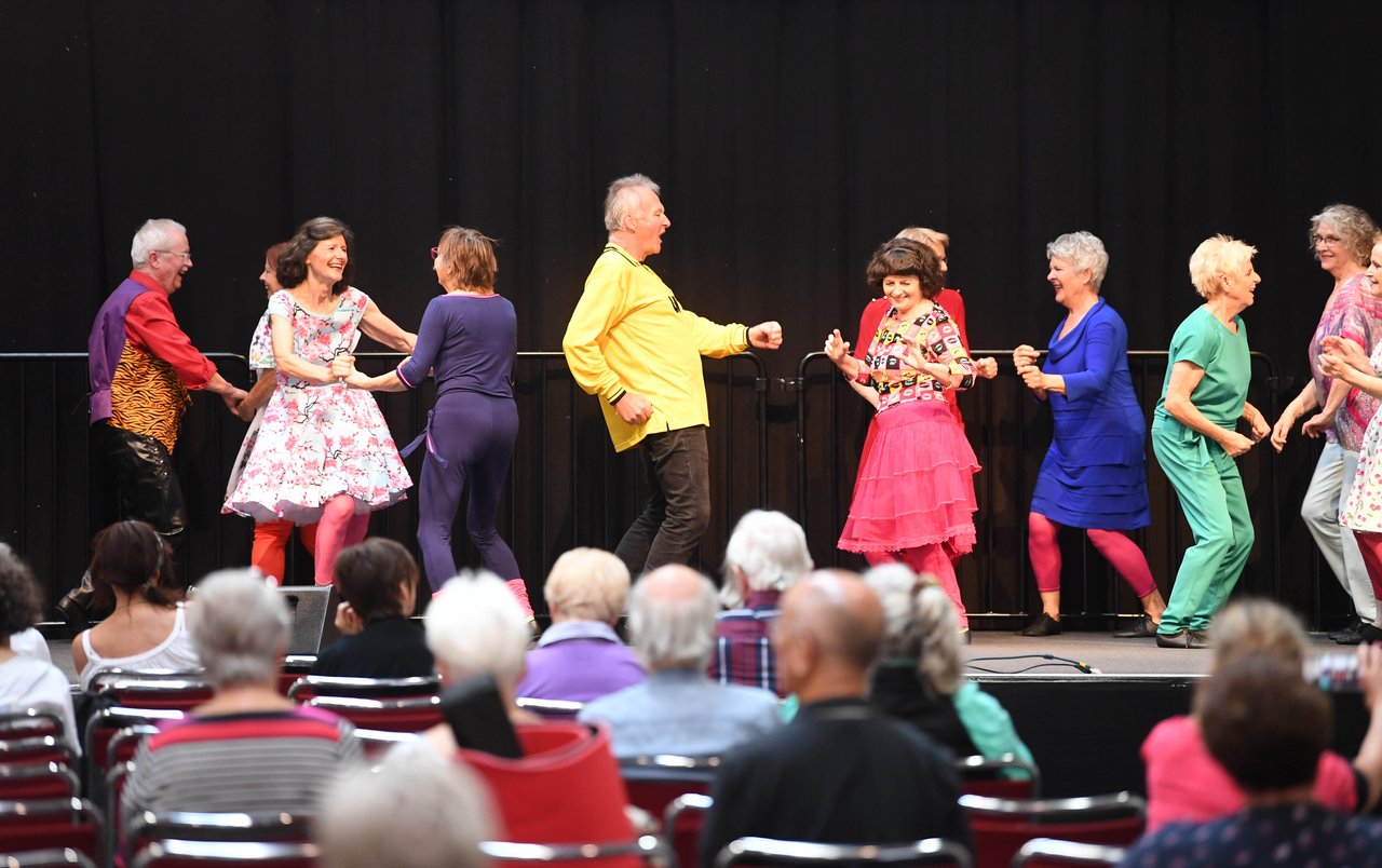 Colorful dance scene on stage